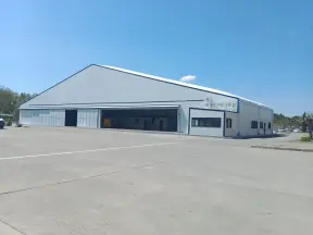 Aircraft hanger with hanger door open